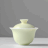 e4d77078f13c369d38a01fa2aeec2e26 90ml porcelain gaiwan with pale yellow outer glaze and soft pink-purple interior