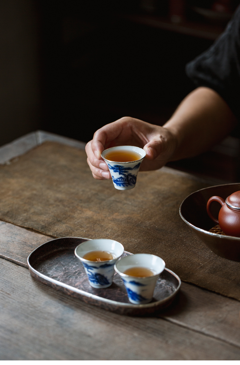 Hand-Painted Blue & White Porcelain Teacup with Silver Trim