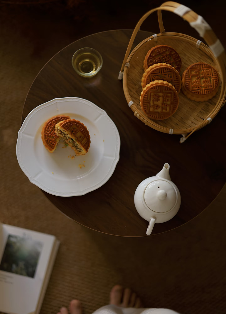 Mooncakes and Chinese tea on a simple tea table